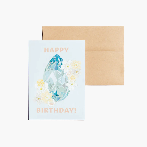 Happy Birthday card showcasing an illustrated March birthstone of aquamarine and birth flowers of daffodil and jonquil.Birthday card showcasing an illustrated March birthstone of aquamarine and birth flowers of daffodil and jonquil.