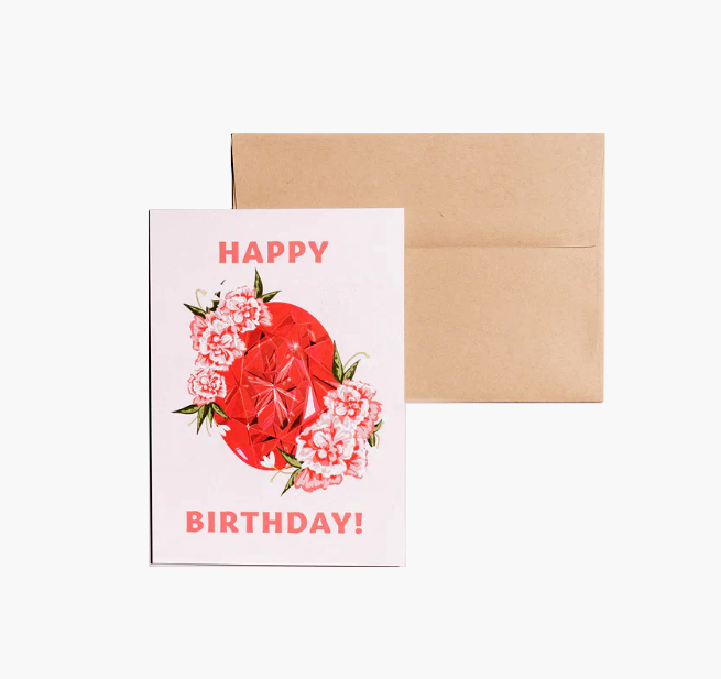 Birthday card showcasing an illustrated January birthstone garnet and birth flowers of carnation and snowdrop.