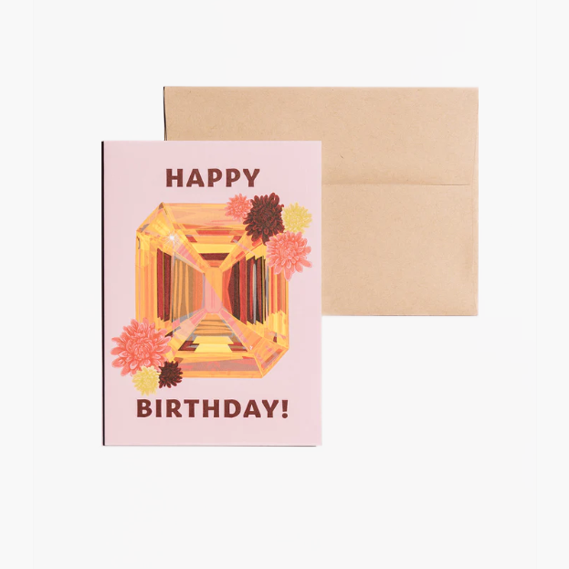 Happy Birthday card showcasing an illustrated November birthstone of topaz and birth flowers of chrysanthemum.