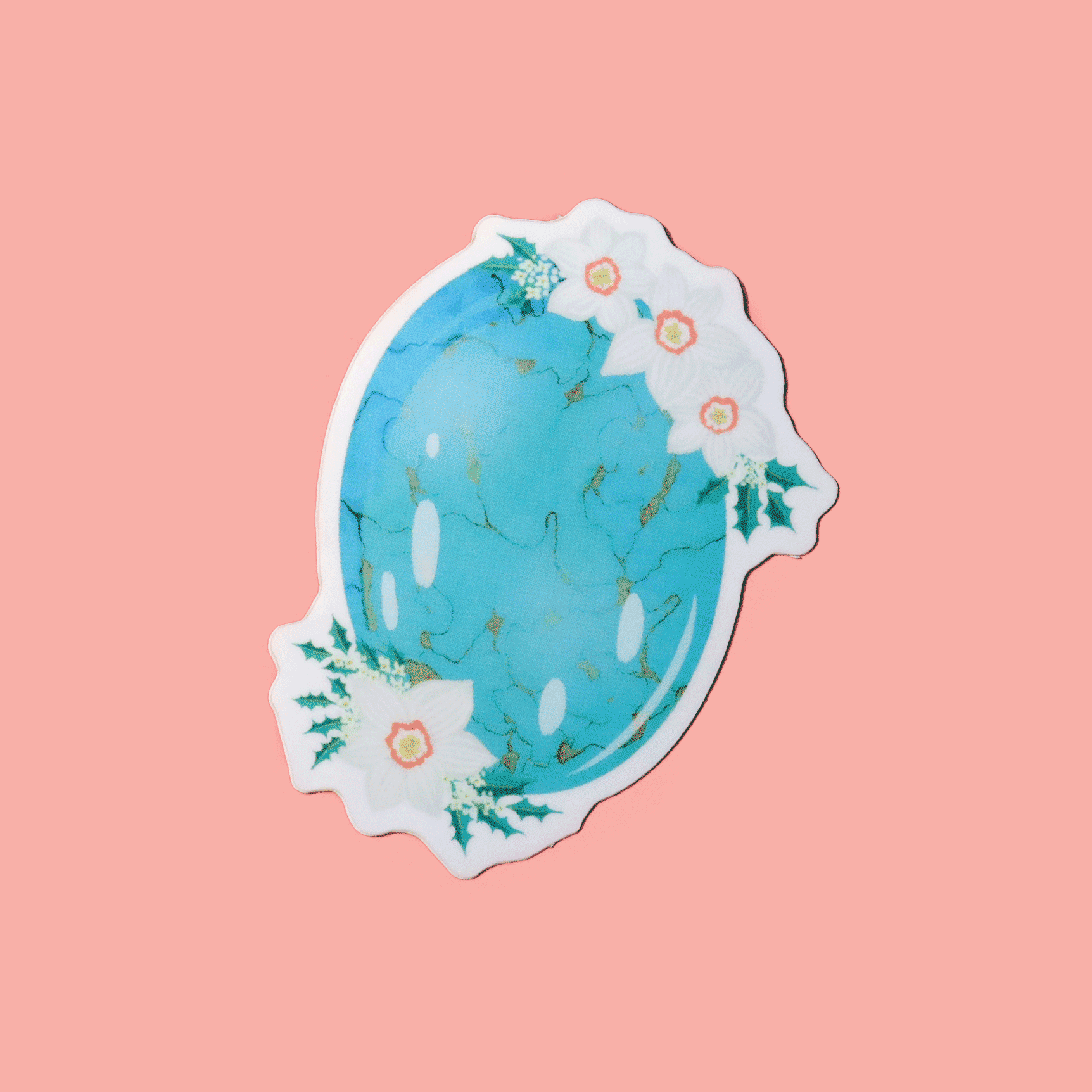 Sticker showcasing an illustrated December birthstone of turquoise and birth flowers of holly and narcissus.