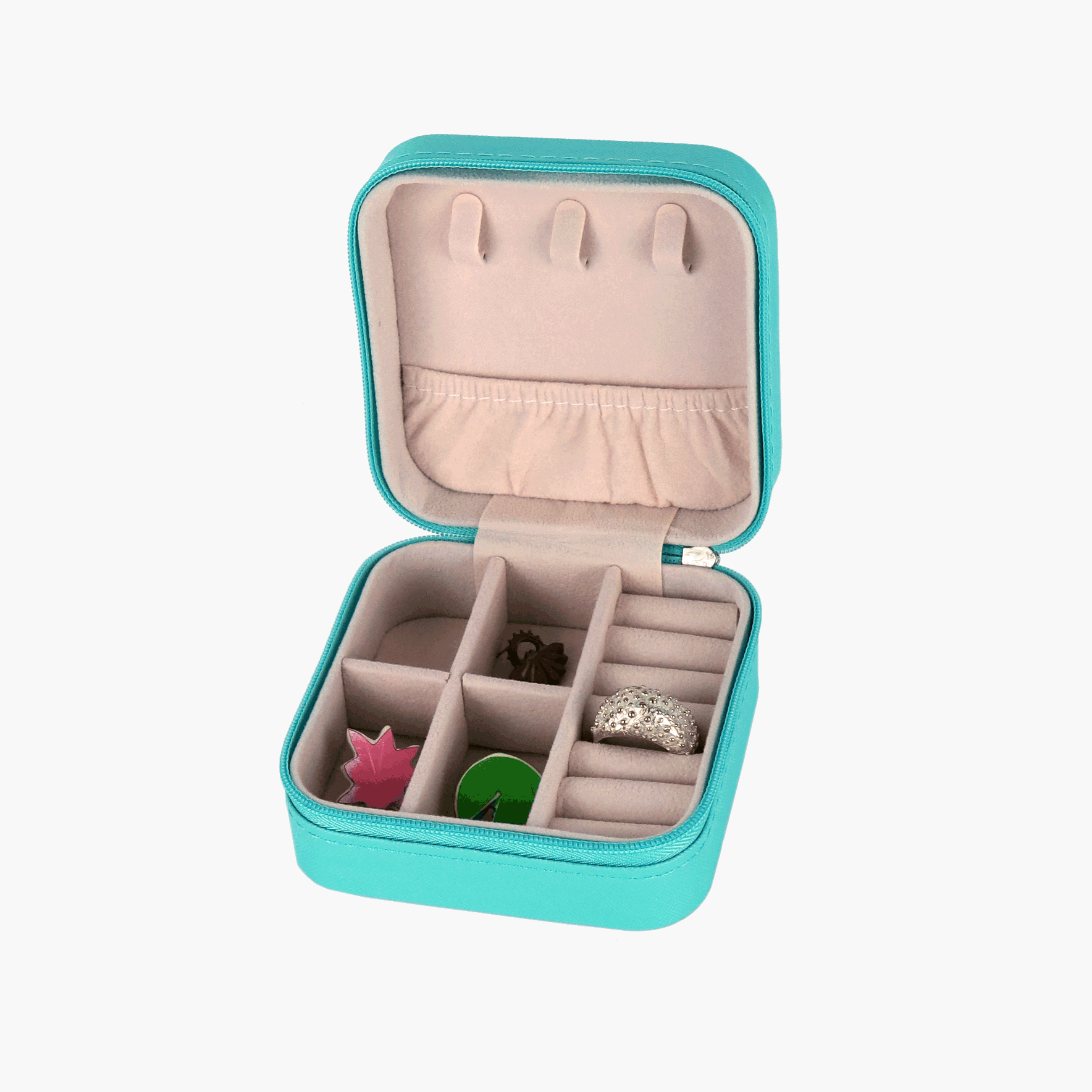 Small square turquoise jewellery travel case.  The case has a zipper and holds four pairs of earrings, six rings and three chains.