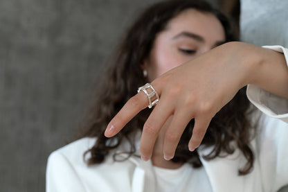 Model wearing sterling silver WALO ring by Kim Paquet