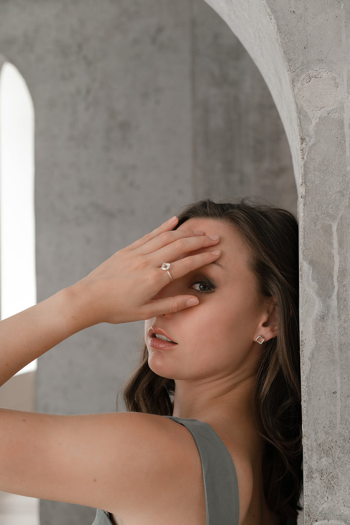 Model wearing MANO earrings by Kim Paquet