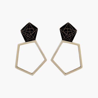 Sterling silver stud earrings with a scored line pattern, playing with positive and negative space, suitable for day or night wear.