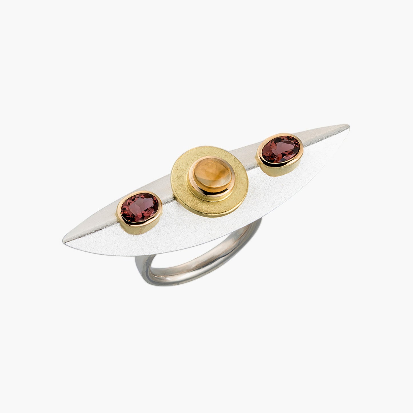 Sterling silver statement ring with almond-shaped design, featuring a round golden citrine and two oval tourmaline gemstones set in 18k gold