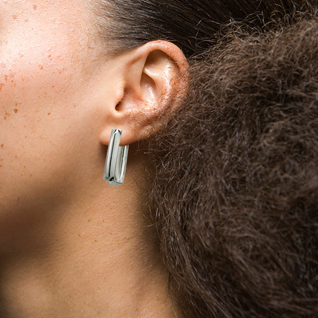Model wearing sterling silver CASO earrings by Kim Paquet
